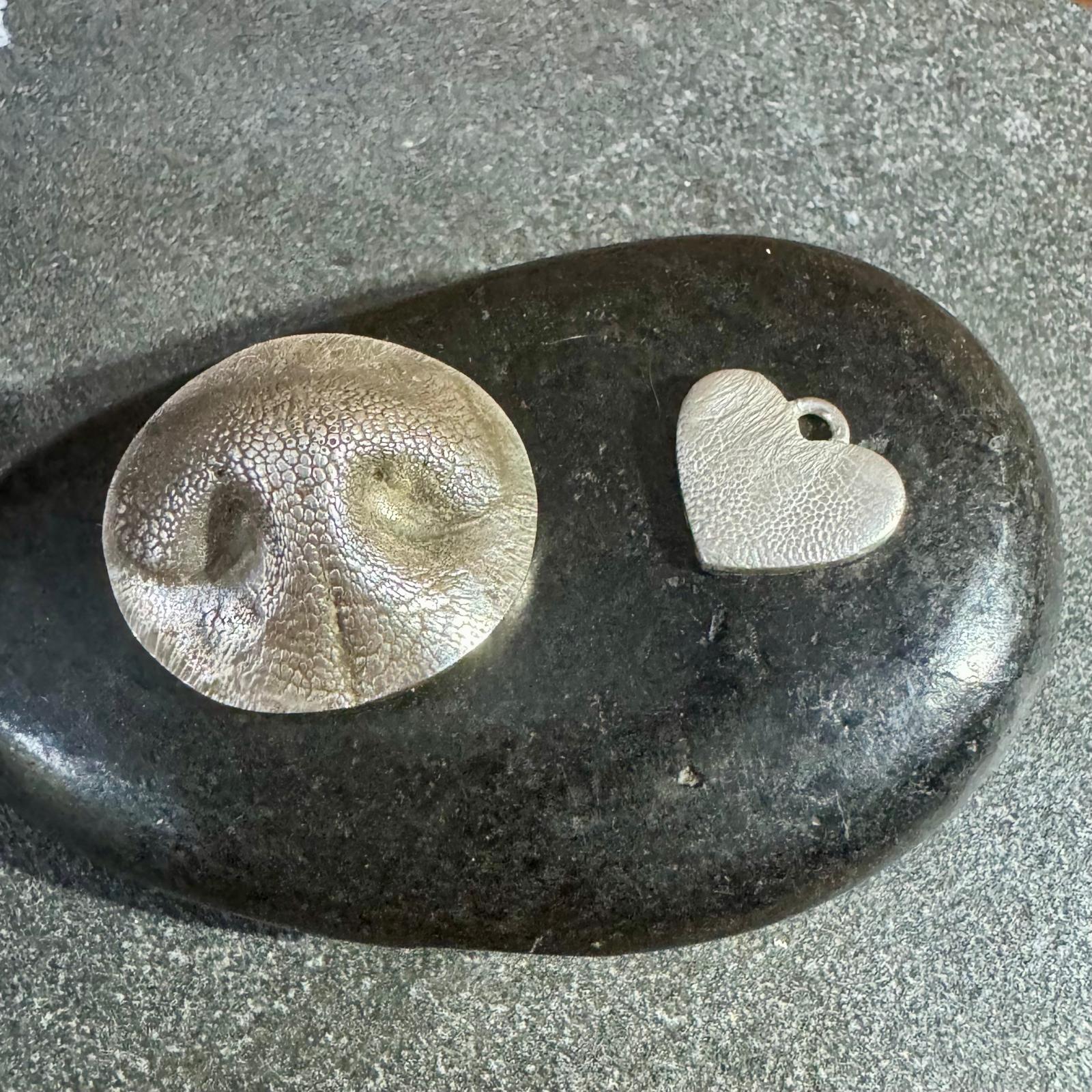 Nose and paw-print keepsakes in silver
