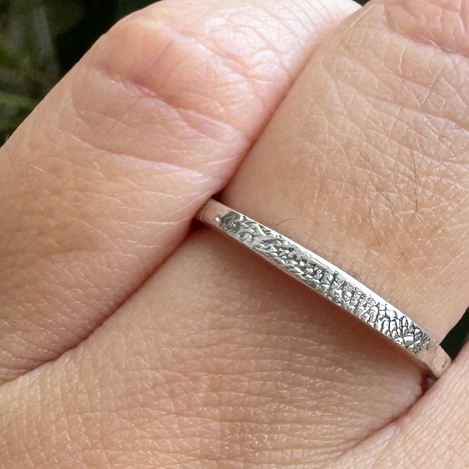 Close-up of a pawprint ring showing fine details