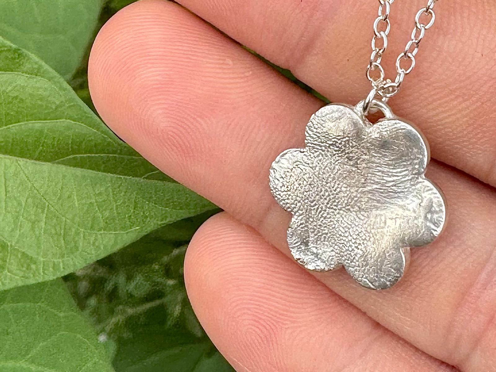 999 pure silver six petal paw-print pendant is sweatproof for everyday wear